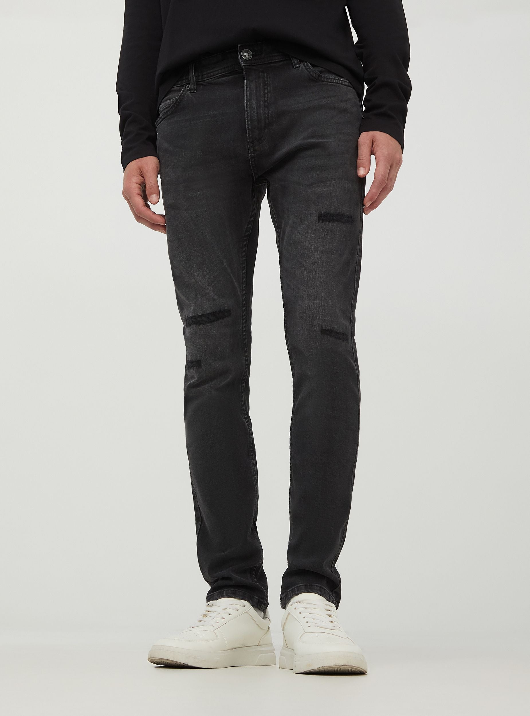Jeans skinny fit con effetto strappi Nero denim