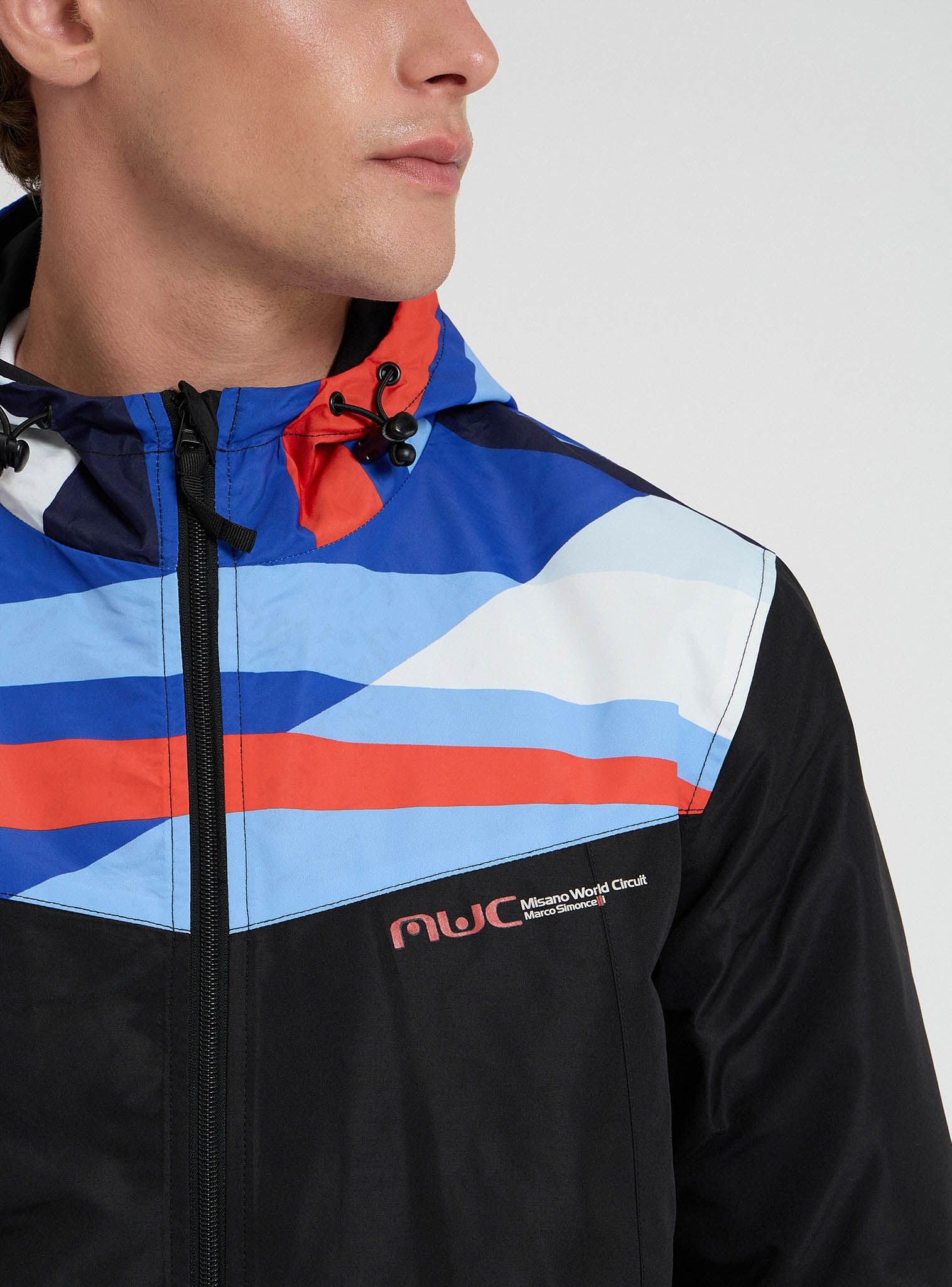 Giacca a vento block multicolor con cappuccio MWC