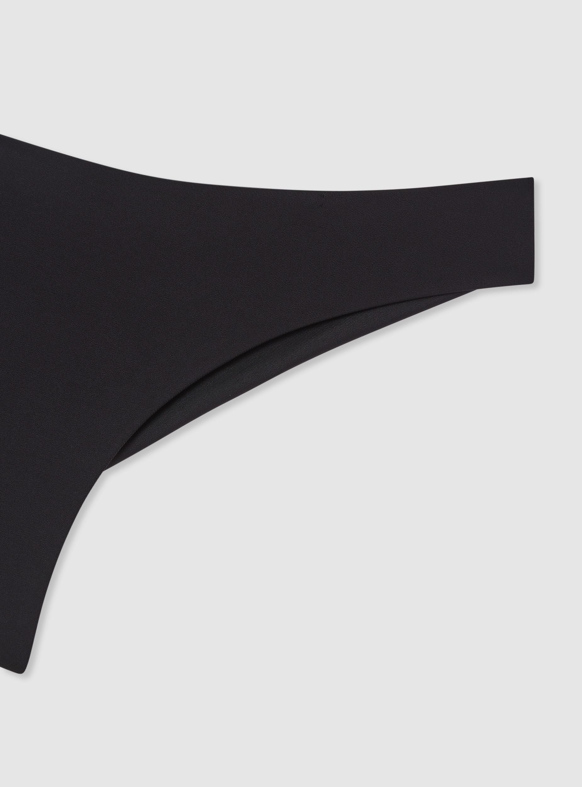 Slip bikini brasiliana tinta unita ricamo logo TRN