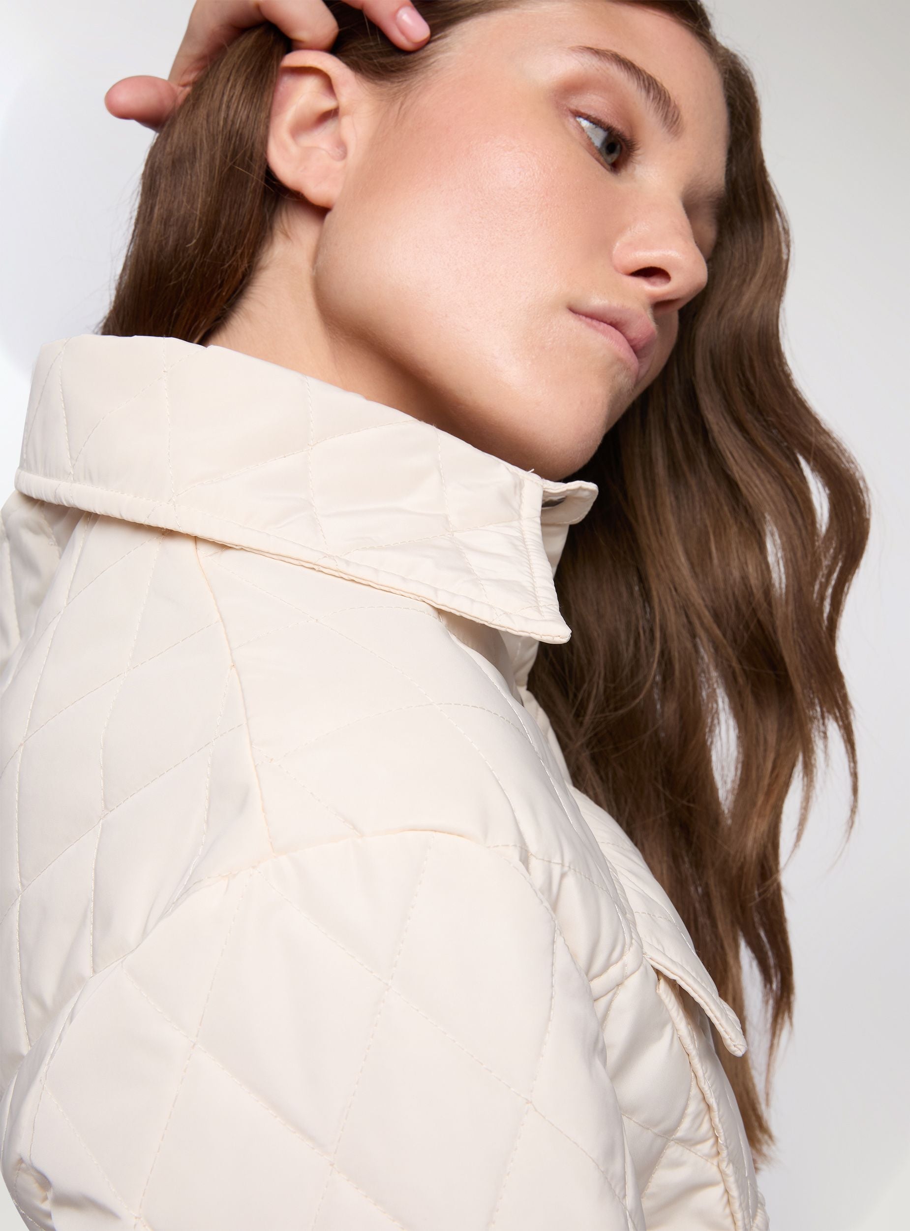 Giacca trapuntata crop con tasche a pattina