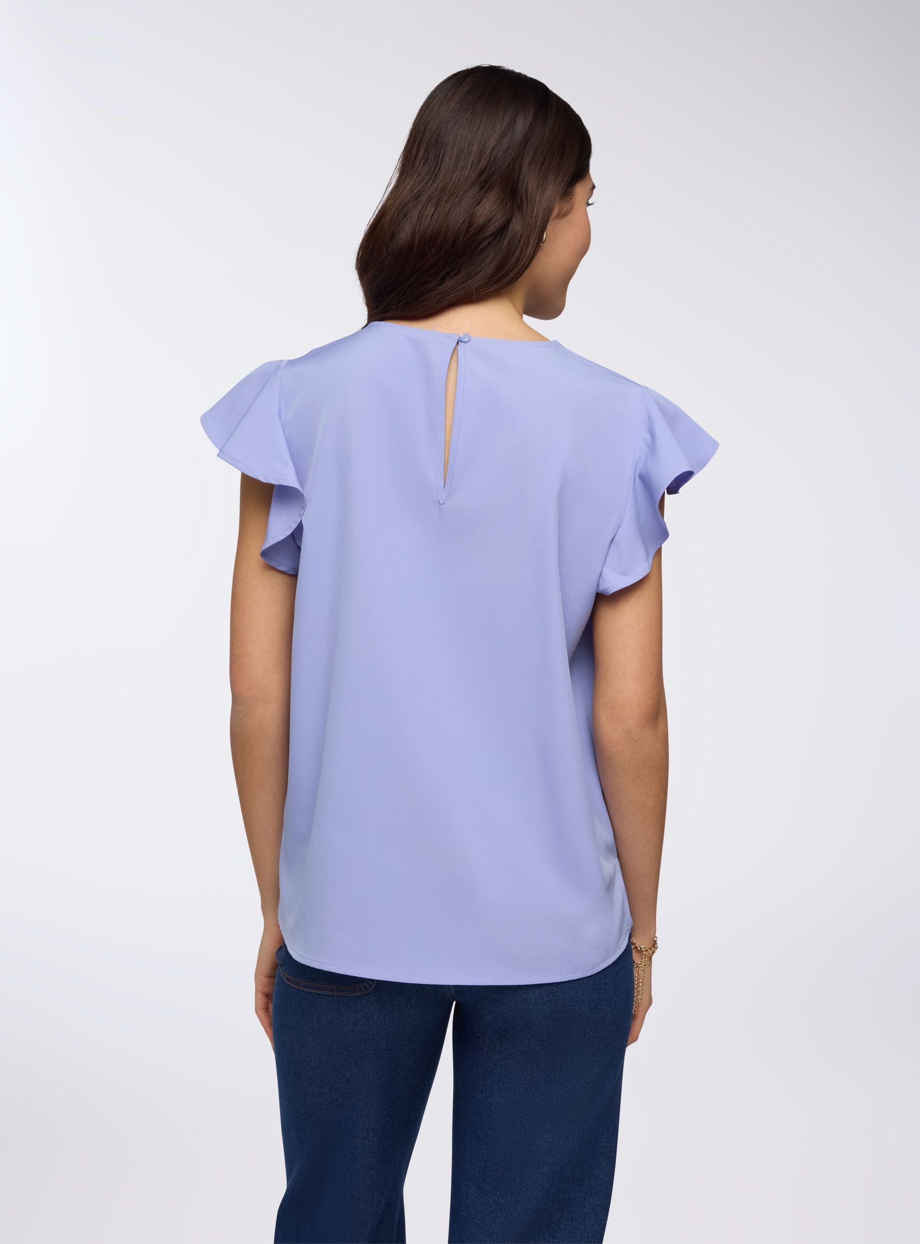 Blusa tinta unita a maniche corte