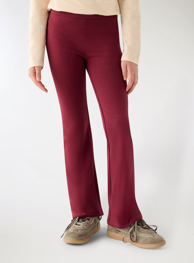 Leggings lunghi a zampa tinta unita