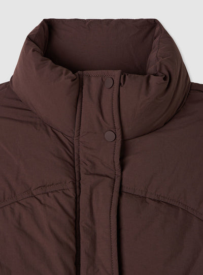 Short padded jacket with high collar
