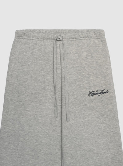 Pantaloni tuta wide leg con ricamo college