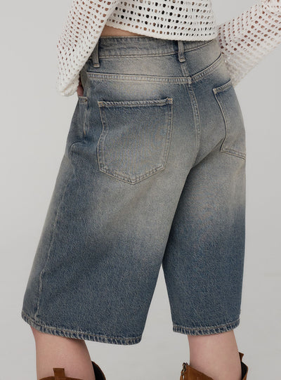 Denim jorts with distressing