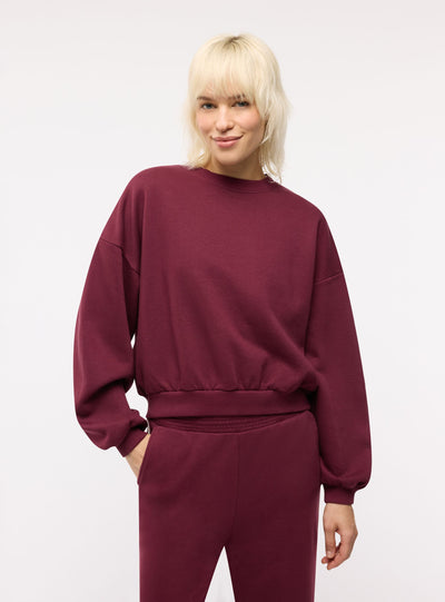 Pantaloni tuta wide leg con bande laterali