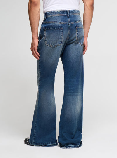 Jeans flare con borchie