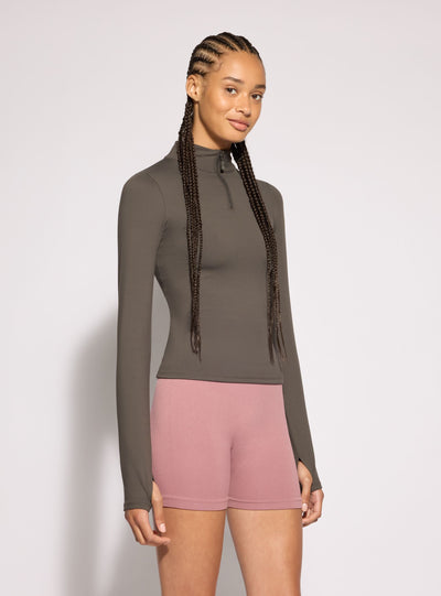 T-shirt sportiva con mezza zip
