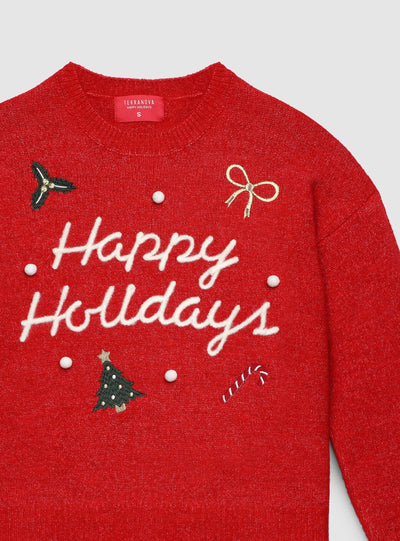Pull large avec inscription de Noël et patch