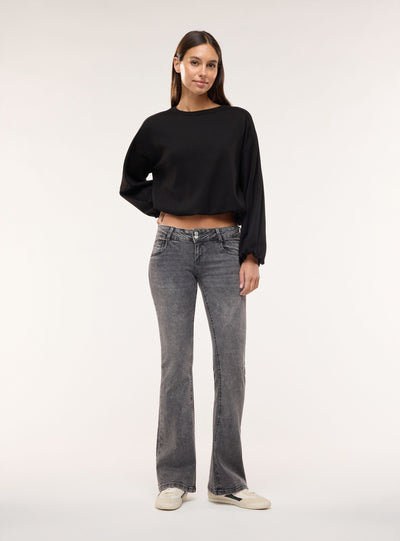 Jeans zampa a vita ultra bassa