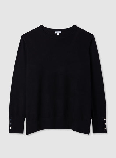 Plain-colour jumper with buttons at the cuffs