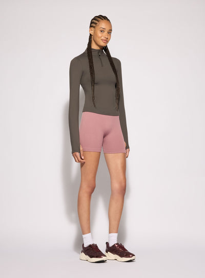 T-shirt sportiva con mezza zip