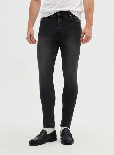 Jeans skinny a tinta unita