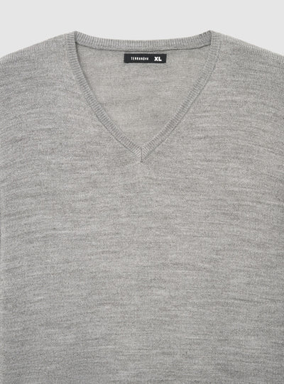 Maglia scollo a V a tinta unita