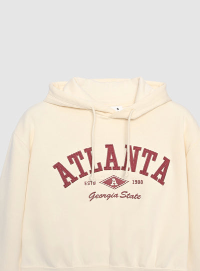 Felpa crop con cappuccio e stampa college