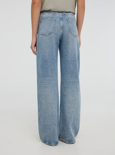 Jeans wide leg con strappi acid wash