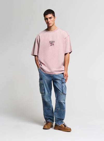 Jeans cargo over a tinta unita