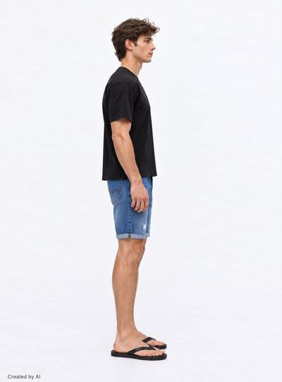 Denim bermuda shorts with small rips