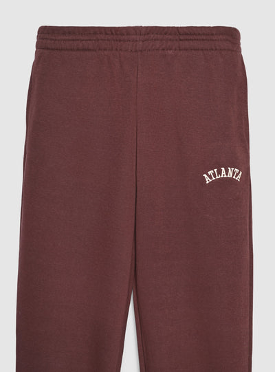 Pantaloni tuta vita alta con scritta college