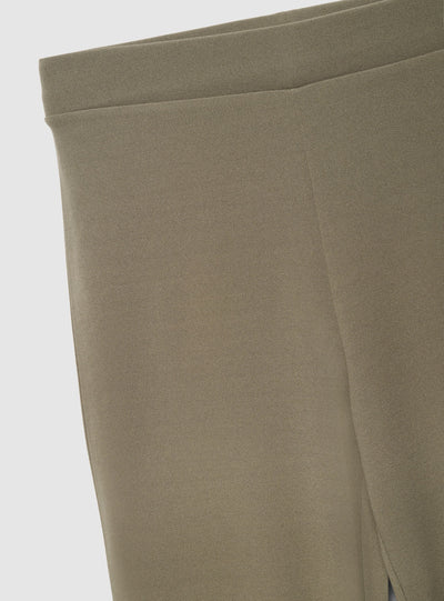 Pantaloni a zampa a tinta unita