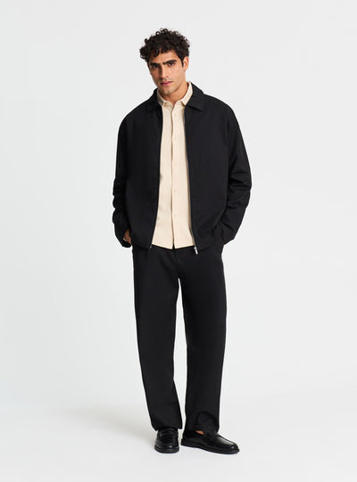 Pantaloni chino wide leg con pinces