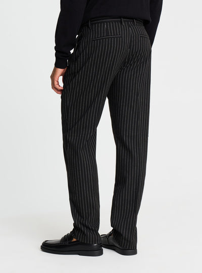 Pantaloni chino con pinces gessati