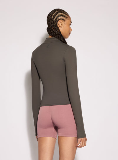 T-shirt sportiva con mezza zip