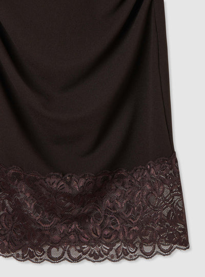 Vestito smanicato con collo cratere e fondo in pizzo