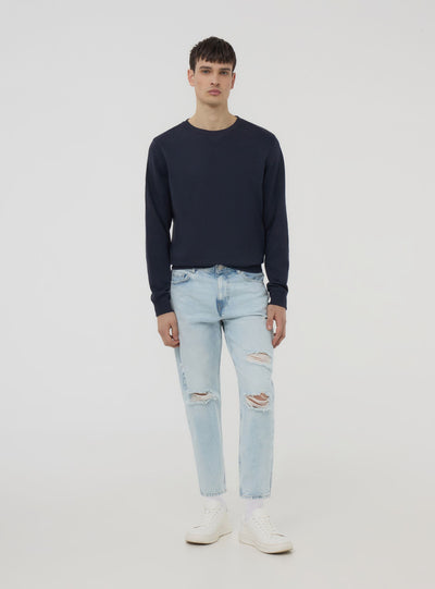 Light loose-fit jeans with rips