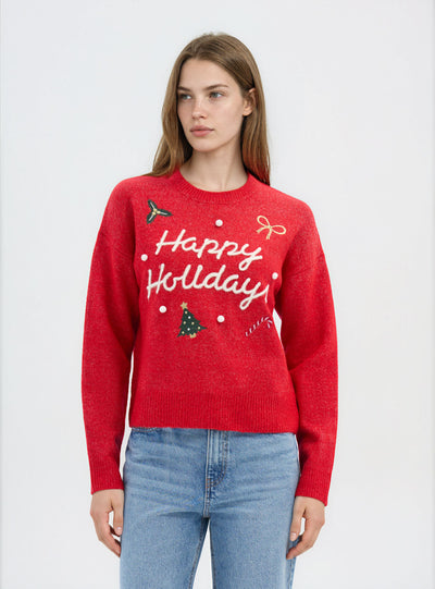 Pull large avec inscription de Noël et patch