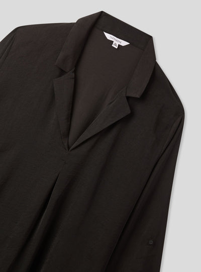 Plain-coloured blouse with V-neckline