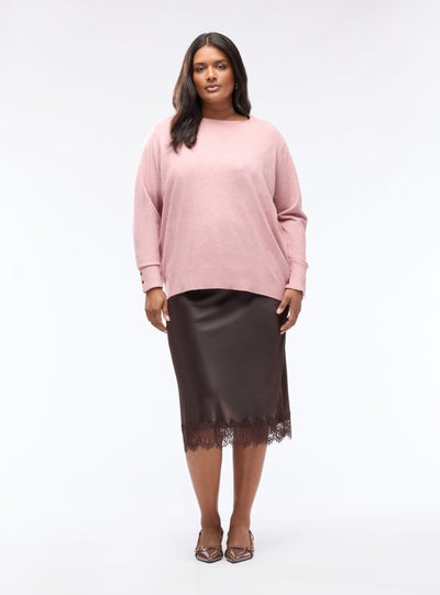 Plain-colour jumper with buttons at the cuffs