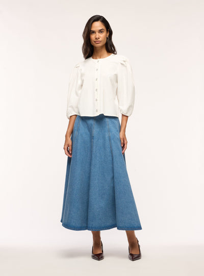 Blusa con bottoni gioiello e maniche a sbuffo