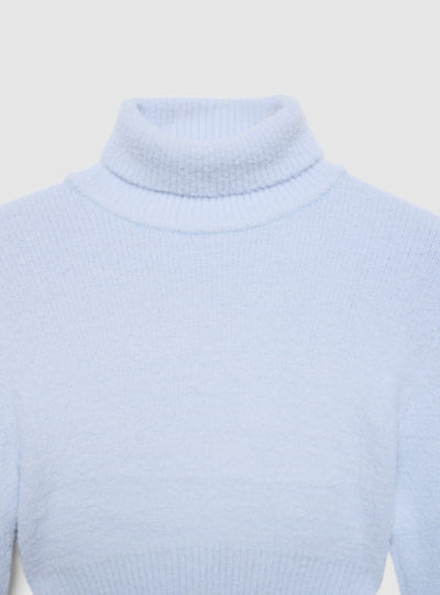 Maglia crop dolcevita a tinta unita