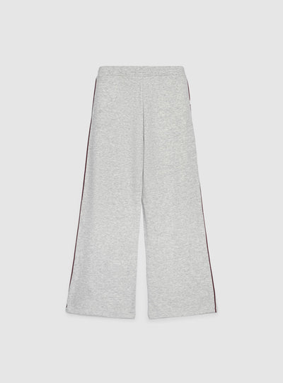 Pantaloni tuta wide leg con piping laterale