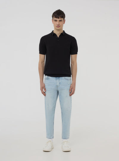 Loose fit jeans with small rips