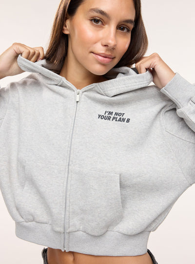 Felpa crop con cappuccio e zip con scritta