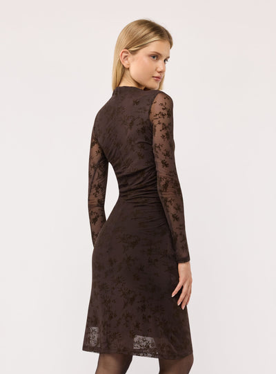 Vestito aderente con arricciature e stampa floreale