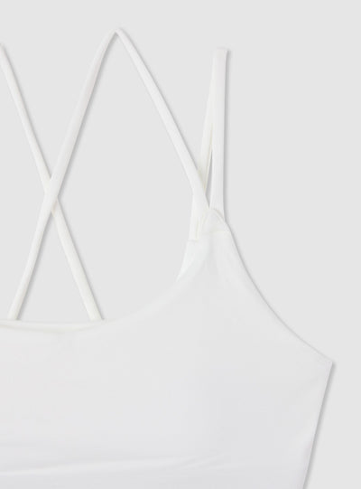 Bra top sportivo con spalline incrociate e logo