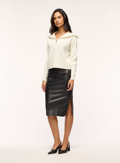 Maglia a coste con zip al collo