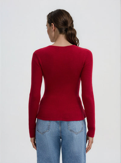 Maglia peplum effetto luccicante