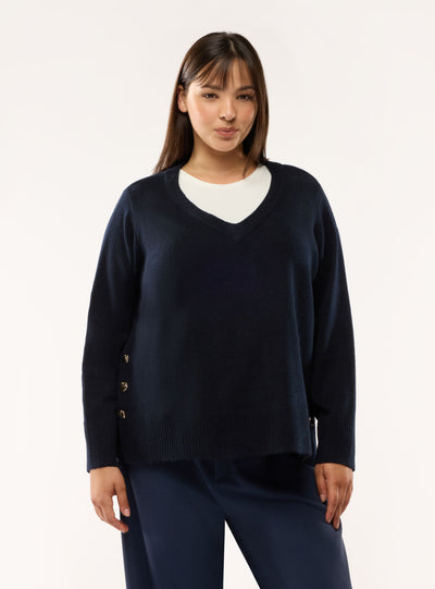 Maglia con scollo a V e bottoni laterali