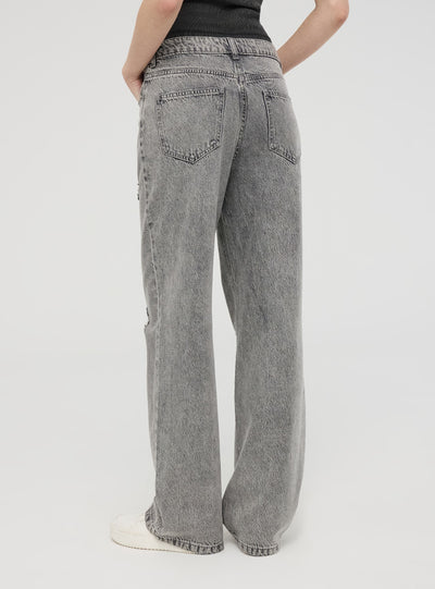 Jeans wide leg con strappi ampi