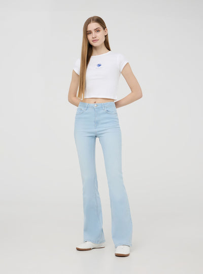 Jeans chiari a zampa a vita alta