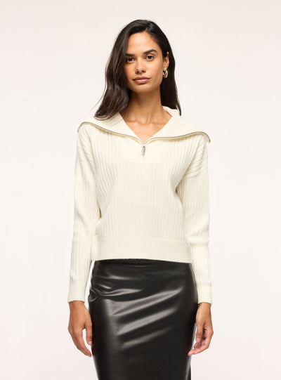 Maglia a coste con zip al collo