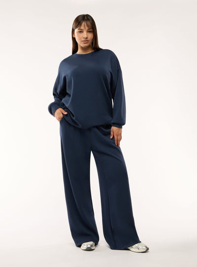 Pantaloni tuta wide leg a tinta unita