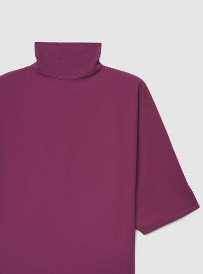 Blusa con collo alto e maniche 3/4