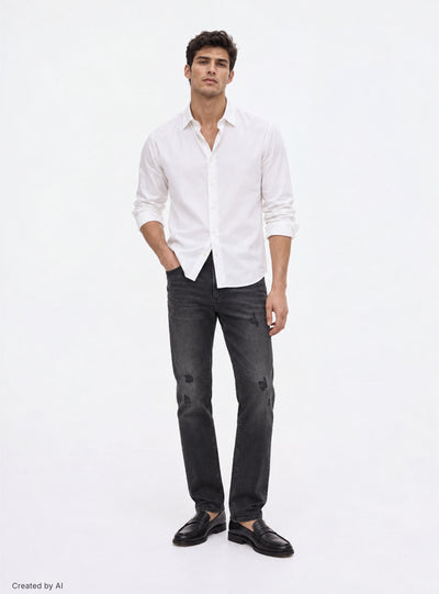 Jeans skinny con strappi piccoli