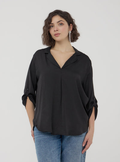 Plain-coloured blouse with V-neckline