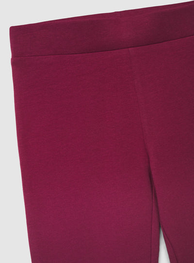 Leggings lunghi a zampa tinta unita
